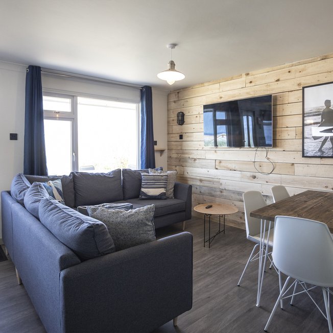 
                The lounge area of our bright and spacious luxury chalet. The perfect way to stay.
                