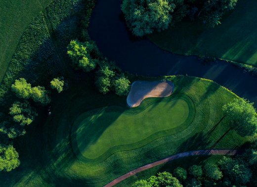 A drone image of the golf course at Appletree Holiday Park.