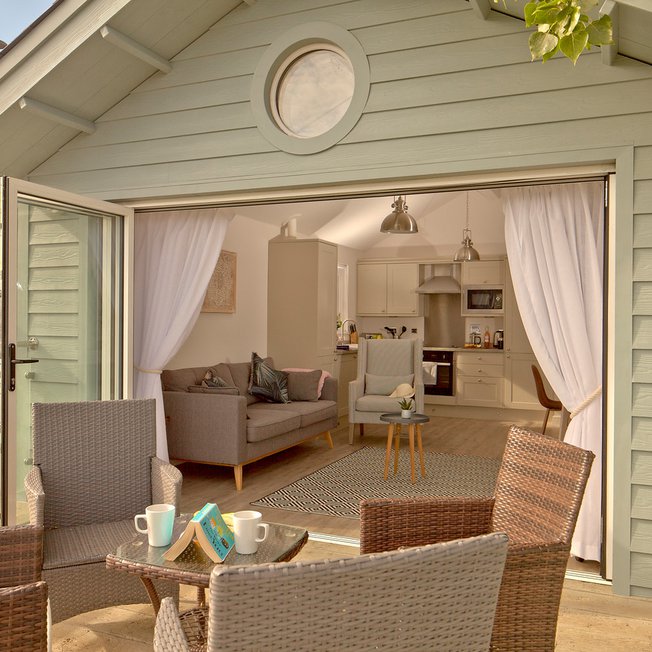 
                The decking area of our Exclusive Beach Lodge at The Bay Colwell. Book your holiday now!
                