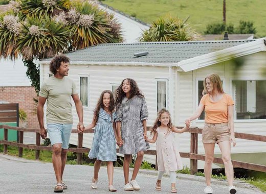 Family walking around our Newquay Bay Holiday Park.