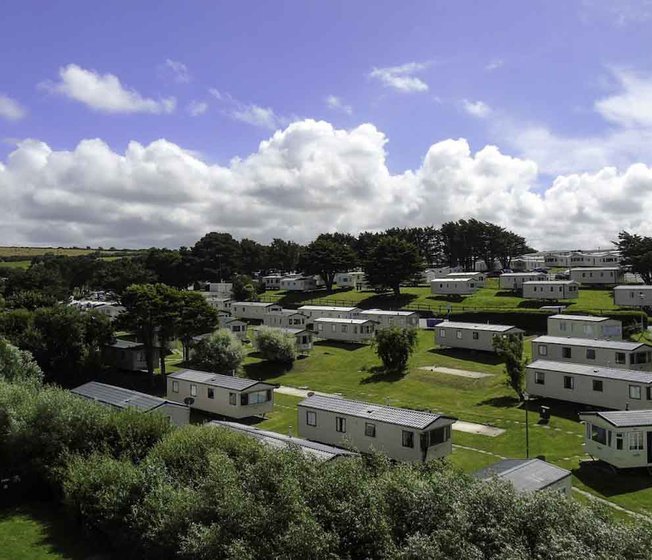 An aerial shot of a selection of caravans at Away Resorts Newquay Bay park.