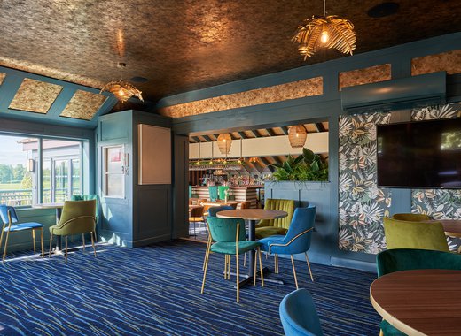 Seating area inside the Tipsy Eagle Bar at Appletree Holiday Park.