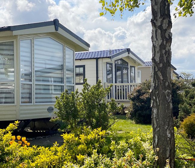 Our holiday homes at Cleethorpes Pearl holiday park. There are three amazing lodges surrounded by beautiful garden space.
