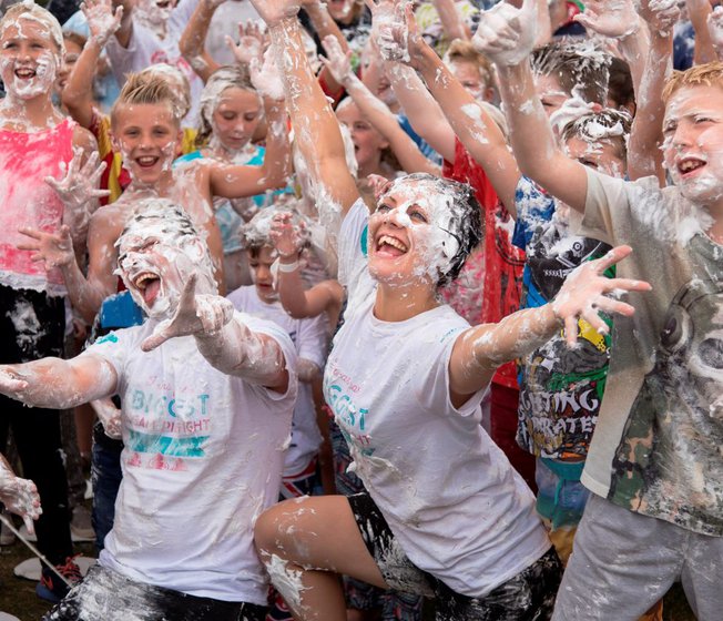 A group of people enjoying our awesome event, the Custard Pie Fight!