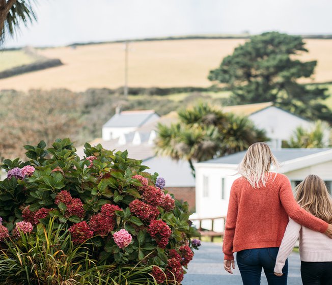 Family visiting Newquay Bay Holiday Park during the autumn months.