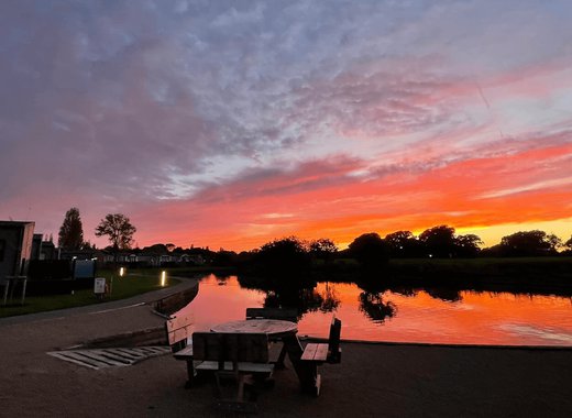 The beautiful sunset orange sky across our Mill Rythe Holiday Park.