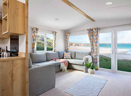 The lounge area of one of our caravans at The Lakes Rookley. The perfect way for the family to stay.