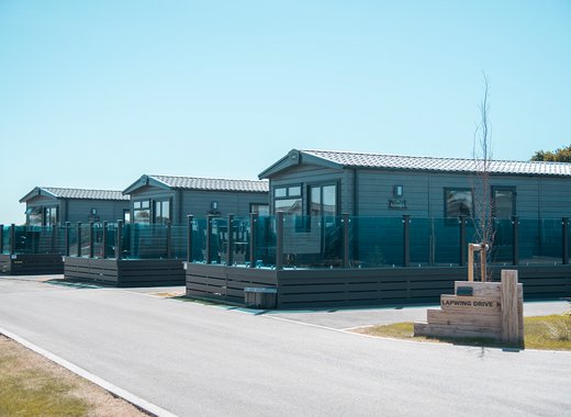 Exterior of our lodges at Mill Rythe Holiday Park, Hampshire.