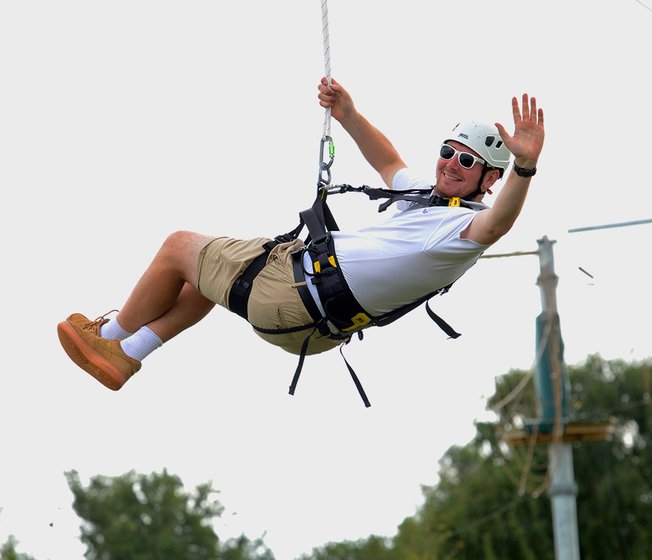 A man enjoying the zip wire activity at Tattershall Lakes.